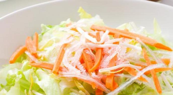 Carrot salad with cheese and garlic